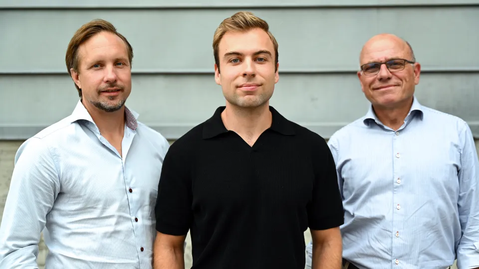 Johan Malmström, Erik Hartman, and Artur Schmidtchen together outdoors.